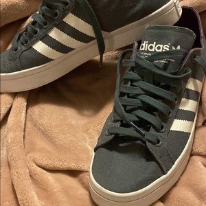 Grey and white size 10 women Adidas. Only worn once. No scratches or scuffs